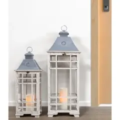 HomeRoots Set of Two White And Silver Distressed Geometric Metal Floor Lantern Candle Holders