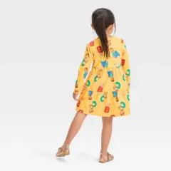Toddler Girls' Cocomelon Printed Tunic Dress - Mustard Yellow