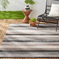 7'9" x 10'2" New York Patio Sofia Estelle Indoor/Outdoor Rug Gray/Mustard - Nicole Miller