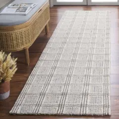 Ebony EBN119 Handmade Tufted Rug - Safavieh