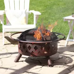Sunnydaze Outdoor Camping or Backyard Crossweave Cut Out Fire Pit with Spark Screen, Log Poker, and Metal Wood Grate - Bronze