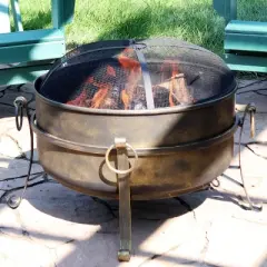 Sunnydaze Outdoor Camping or Backyard Round Cauldron Fire Pit with Spark Screen, Log Poker, and Metal Wood Grate