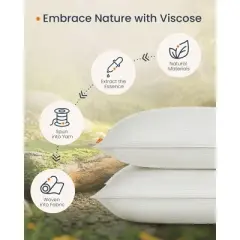 Set of 2 King-size cloud white bed pillows. They are down-alternative hotel-quality pillows with a skin - friendly viscose cooling seersucker cover.