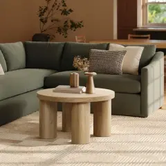 LuxenHome Round Wood Coffee Table with 4 Pillar Legs, 27.5" Modern Farmhouse Oak Finish Low Accent Table with Sturdy Base for Living Room Brown