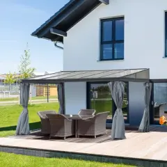 Outsunny 10' x 13' Outdoor Patio Gazebo with Sloping Polycarbonate Roof, Durable Aluminum Frame, & Netting Curtain