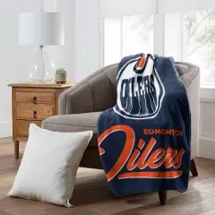 NHL Edmonton Oilers 50 x 60 Raschel Throw Blanket