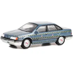 1986 Ford Taurus Blue Met. "Zalinsky Auto Parts" Crash Test Vehicle "Tommy Boy" 1995 Movie 1/64 Diecast Model Car by Greenlight