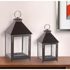 HomeRoots Set of Two Black Geometric Iron And Glass Floor Lantern Candle Holders