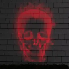 Northlight Halloween Skull Outdoor Light Show Projector - 8"