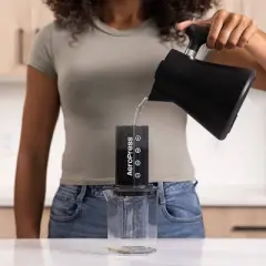 AeroPress Original Coffee Press: Manual Single Serve Coffee Maker, 8 oz Capacity, Includes Scoop & Paper Filters, Black