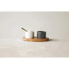 Storied Home Round Marble Bowls on Mango Wood Tray with Brass Salt Spoon, White and Black, Set of 2