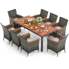 Costway 9 Pieces Outdoor Wicker Dining Set with Acacia Wood Table and 8 Armchairs