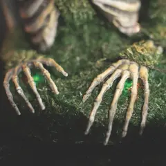 9 3/4" x 14 3/4" Mossy Skeleton Tabletop Animated Prop Halloween Decoration