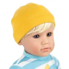 Adora Toddler Doll "Dino Boy" in Striped and Dino print top, coordinating Dino Pants and Yellow Sneakers