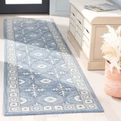 Ebony EBN651 Handmade Tufted Rug - Safavieh