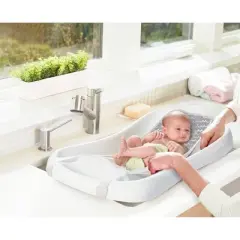 The First Years Sure Comfort Deluxe Newborn-to-Toddler Tub with Sling