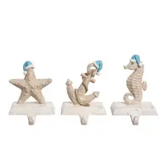 Transpac Coastal Christmas Stocking Holder Set of 3 Colorful Resin Mantel Decorations for Holiday Decor and Gift Giving