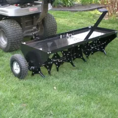 Yard Tuff 48 Inch Steel Tow Behind Plug Aerator with Pneumatic Tires, 32 Coring Plugs, and Universal Hitch For Lawn Mowers, Garden Tractors, and ATVs