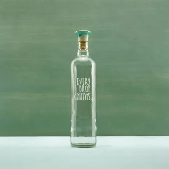 Drop Glass Water Bottle with Ceramic Stopper-750 ML image {1}