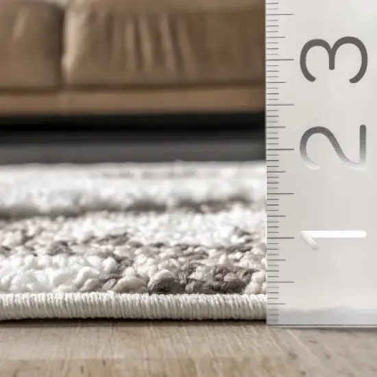 nuLOOM Amalia Southwestern High Low Shaggy Tassel Area Rug image {2}