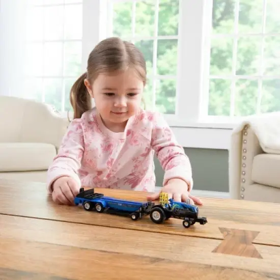 1/64 New Holland "Midnight Blue" Pulling Tractor with Pulling Sled, 37940-2 image {5}