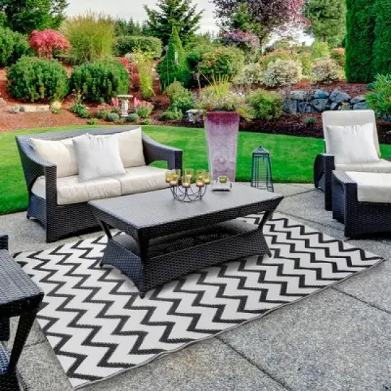 Northlight 4' x 6' Black and White Chevron Rectangular Outdoor Area Rug image {1}