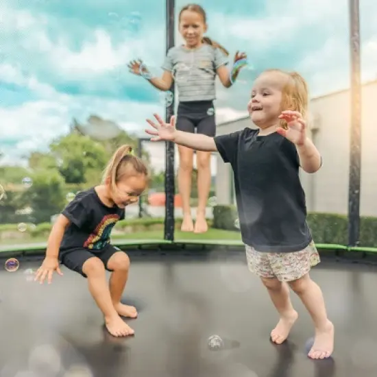 JumpFlex HERO Round Outdoor Backyard Trampoline Playset for Kids with Net Safety Enclosure and Ladder image {3}