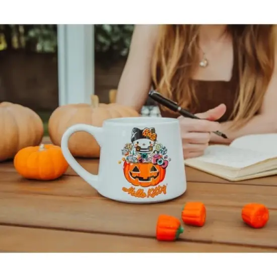 Silver Buffalo Sanrio Hello Kitty Pumpkin Candy Burglar Tapered Pottery Mug | Holds 14 Ounces image {2}