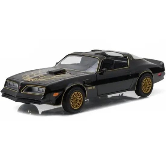 1977 Pontiac Firebird Trans Am T/A Starlite Black with Golden Eagle Hood and Stripes 1/24 Diecast Model Car by Greenlight image {1}