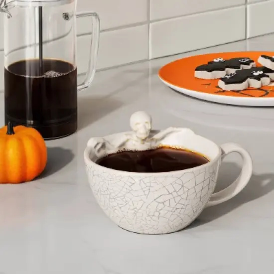 12.5 fl oz Stoneware Skeleton in Latte Mug with Crackle - Hyde and EEK! Boutique&trade; image {1}