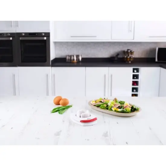 ZYLISS Egg Slicer - Non Slip, Egg Cutter and Wedger with Built in Shell Piercer: Manual Chopper, Ergonomic Handle image {9}