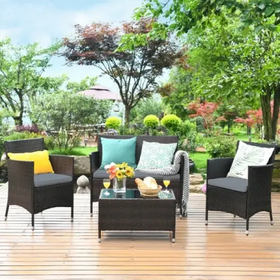 Costway 4PCS Rattan Patio Furniture Set Cushioned Sofa Chair Coffee Table image {10}