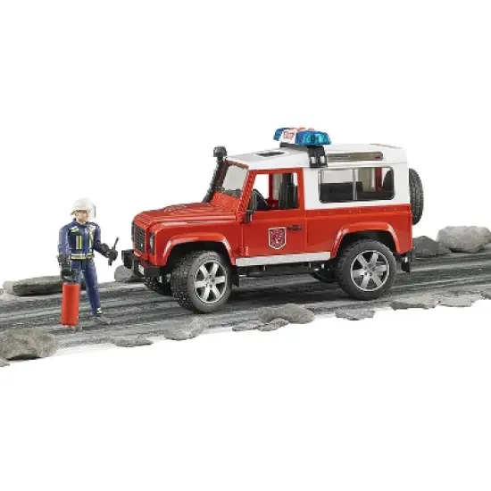 Bruder Land Rover Fire Department vehicle with fireman image {1}