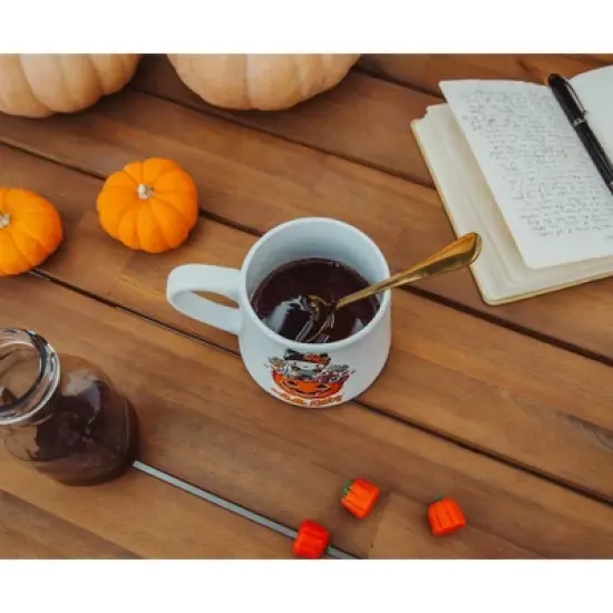 Silver Buffalo Sanrio Hello Kitty Pumpkin Candy Burglar Tapered Pottery Mug | Holds 14 Ounces image {4}