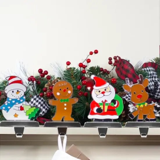 Northlight Set of 4 Christmas Figures Stocking Holders with Silver Base image {1}
