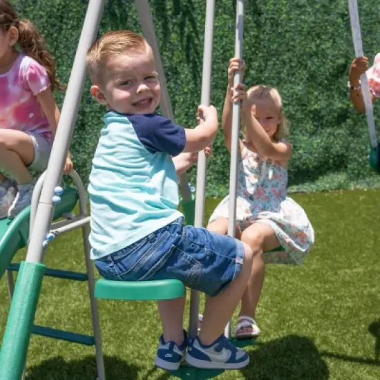 The Swing Company Yonkers Metal Swing Set with Glide Ride Trapeze Bar and 5' Slide image {6}