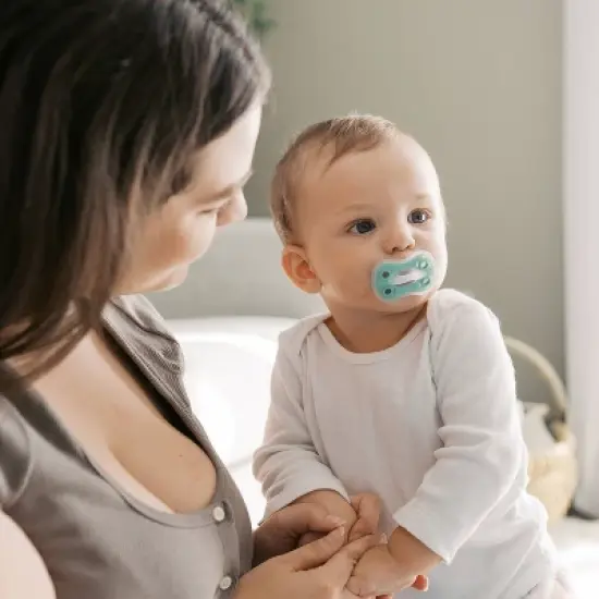 Dr. Brown's Advantage One-Piece Lightweight Silicone Pacifier Stage Two, with one Glow-in-the-Dark Pacifier - 3pk image {11}