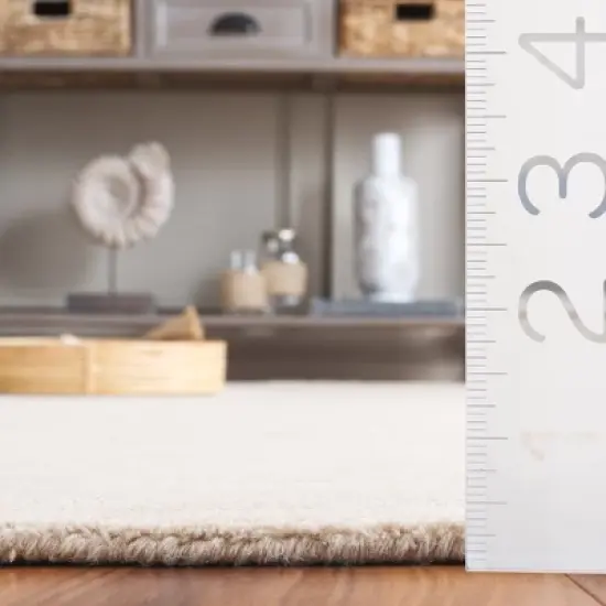 Ebony EBN950 Handmade Tufted Rug - Safavieh image {2}