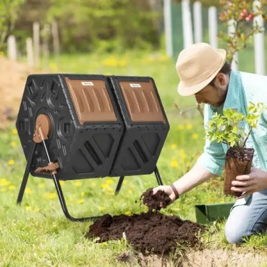 Outsunny Rotating Composter, 34.5 Gallon Dual Chamber Compost Bin with Ventilation Openings and Steel Legs image {2}