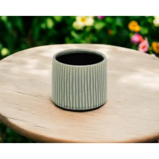HomeRoots 6" Green Striped Ceramic Indoor Outdoor Round Pot Planter image {1}