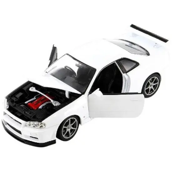 Nissan Skyline GT-R (R34) RHD (Right Hand Drive) White "NEX Models" 1/24 Diecast Model Car by Welly image {1}