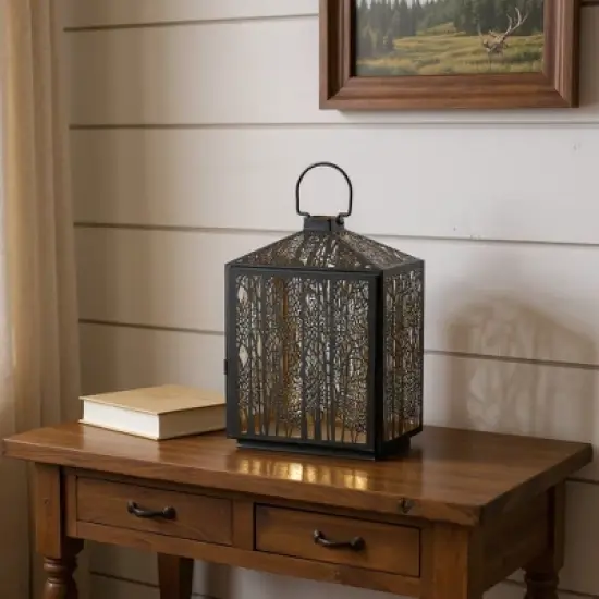 HomeRoots 16" Black And Gold Pierced Floral Metal Lantern Candle Holder image {1}