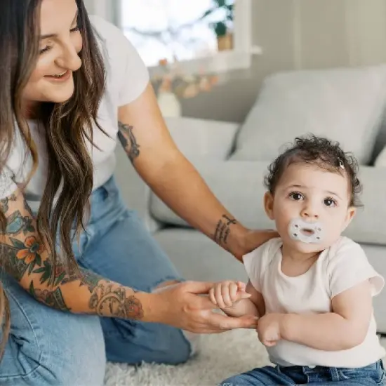 Dr. Brown's Advantage One-Piece Lightweight Silicone Pacifier Stage One, with one Glow-in-the-Dark Pacifier - 3pk image {11}