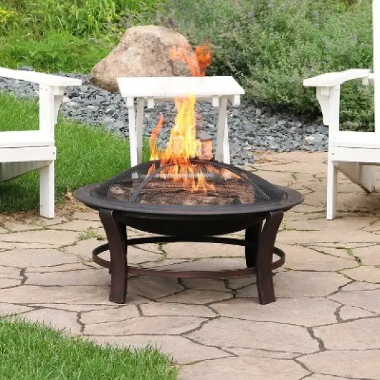 Sunnydaze Outdoor Portable Camping or Backyard Elevated Round Fire Pit Bowl with Stand, Spark Screen, Wood Grate, and Log Poker - 29" - Bronze image {1}