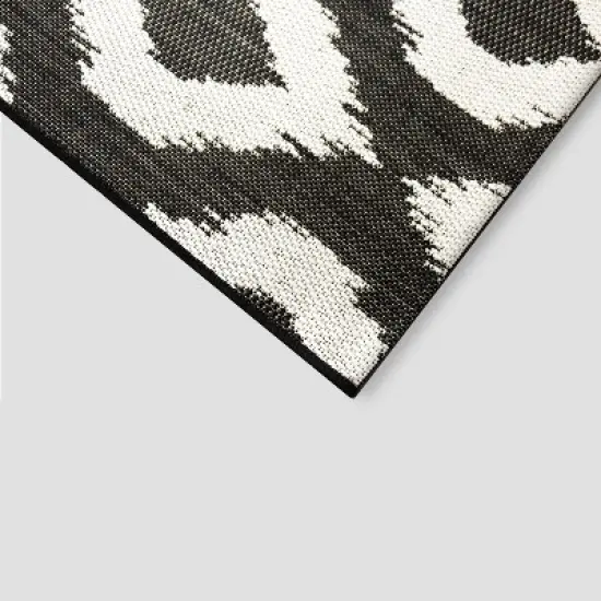 Diamond Ikat Outdoor Rug - Threshold image {1}