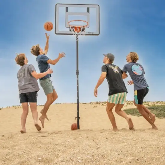 GoSports Post Up Portable Beach Basketball Hoop for Kids and Adults - Play on Grass or Sand - Includes 2 Basketballs, Pump and Accessories Tote image {1}