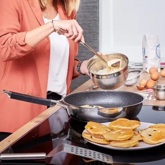 Rosle Stainless Steel Ladle With Hook Handle and Pouring Rim, 2.7-ounce image {1}