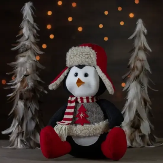 Northlight Sitting Winter Penguin with Trapper Hat Christmas Decoration - 12" image {1}