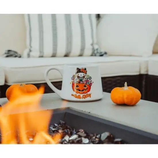 Silver Buffalo Sanrio Hello Kitty Pumpkin Candy Burglar Tapered Pottery Mug | Holds 14 Ounces image {5}