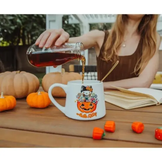 Silver Buffalo Sanrio Hello Kitty Pumpkin Candy Burglar Tapered Pottery Mug | Holds 14 Ounces image {3}